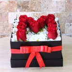 Box of roses and chrysanthemums